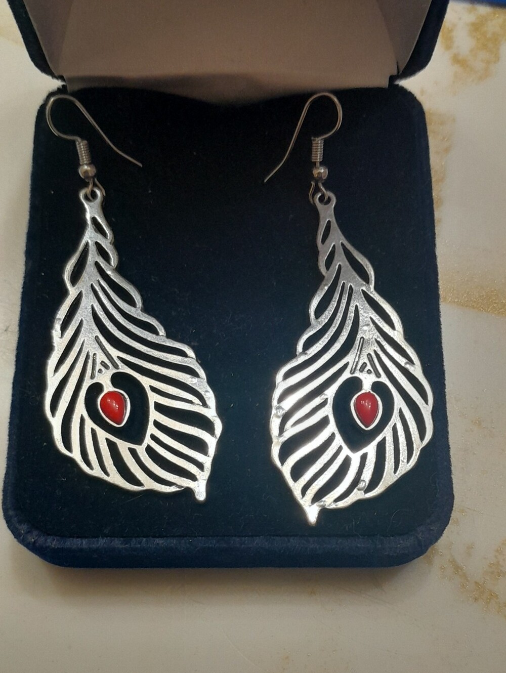 Silver Feather Drop Earrings with Red Heart Accent